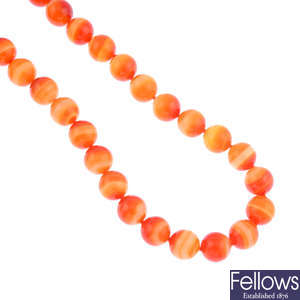 TIFFANY & CO. - a banded agate single-strand necklace.