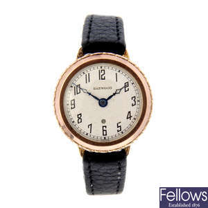 HARWOOD - a 9ct rose gold wrist watch.