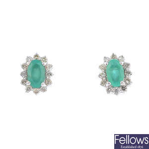 A pair of 9ct gold emerald and diamond cluster earrings.
