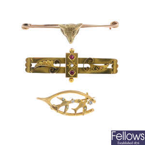Three early 20th century gold brooches.