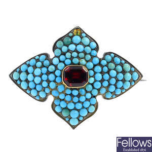 A late Victorian turquoise and garnet brooch.