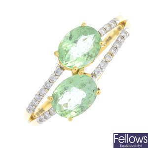 An 18ct gold green tourmaline and diamond ring.