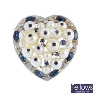 A cultured pearl, sapphire and diamond pendant.