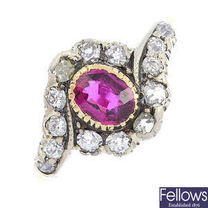 A late Victorian gold and silver ruby and diamond cluster ring.