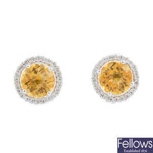 A pair of 18ct gold citrine and diamond cluster earrings.