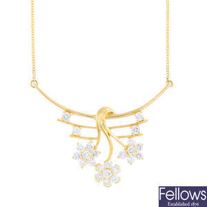 An 18ct gold diamond pendant necklace.