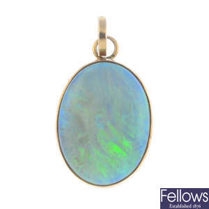 Two opal pendants.