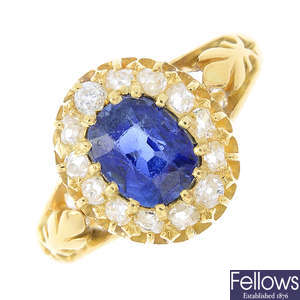 A late Victorian gold sapphire and diamond cluster ring.
