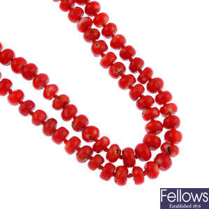 A two-row coral bead necklace.