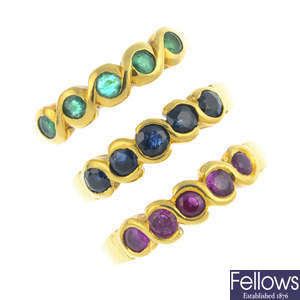 Three sapphire, ruby and emerald five-stone rings.