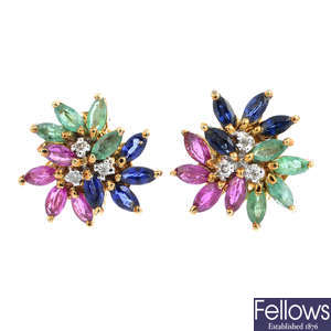 A pair of ruby, sapphire, emerald and diamond earrings.