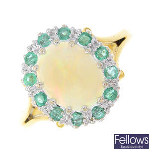 An 18ct gold opal and emerald cluster ring.
