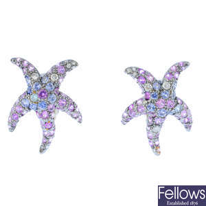 A pair of sapphire and diamond starfish earrings.