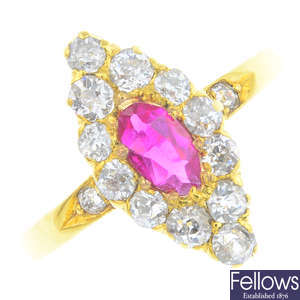 A late Victorian gold ruby and diamond cluster ring.