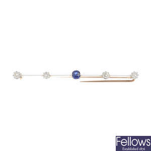 An early 20th century gold and platinum diamond and sapphire bar brooch.