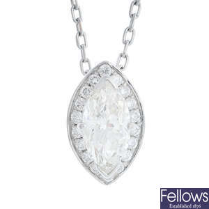 A platinum diamond cluster pendant, with a platinum chain.