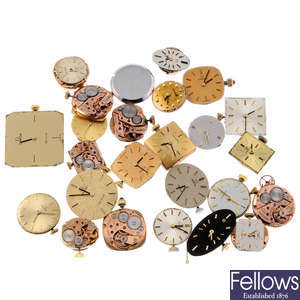 A group of assorted Omega movements. Approximately 24.