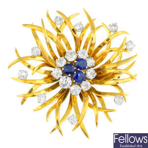 A mid 20th century diamond and sapphire floral brooch.