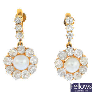 A pair of late Victorian gold natural pearl and diamond earrings.