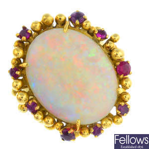 A 1970s 18ct gold opal and ruby ring.