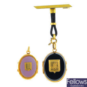 Two late Victorian gold carnelian and onyx lockets.