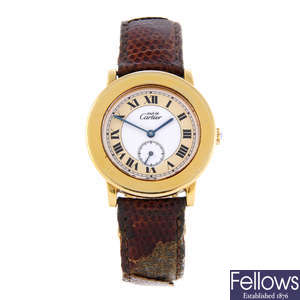 CARTIER - a gold plated silver Must De Cartier Ronde wrist watch.