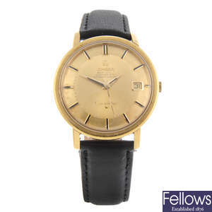 OMEGA - a gentleman's yellow metal Constellation 'Pie Pan' wrist watch.