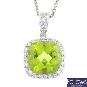 An 18ct gold peridot and diamond cluster pendant, with chain.
