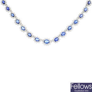 A sapphire and diamond necklace.