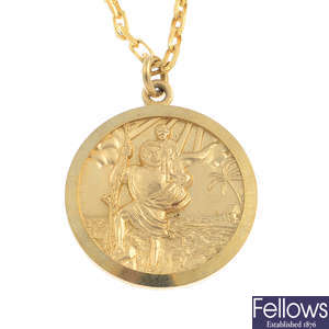 A 9ct gold St. Christopher pendant, with 9ct gold chain.