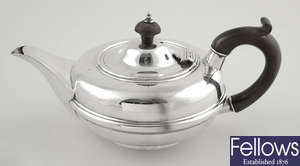 An early twentieth century silver bachelor teapot.