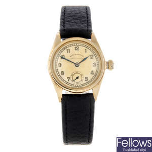 ROLEX - a mid-size 9ct yellow gold Oyster wrist watch.