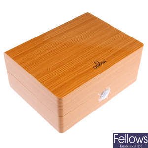 OMEGA - a group of nine assorted watch boxes.