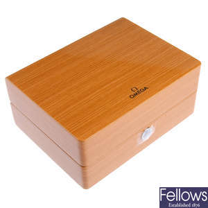 OMEGA - a group of eleven assorted watch boxes.