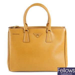 PRADA - a tan Saffiano leather handbag.