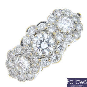 An 18ct gold diamond triple cluster ring.
