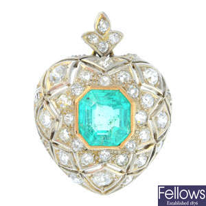 A 14ct gold and silver Colombian emerald and diamond heart pendant.