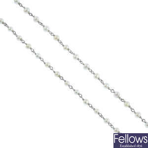 A seed pearl single-strand necklace.