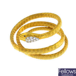 An early 20th century gold diamond snake bangle.