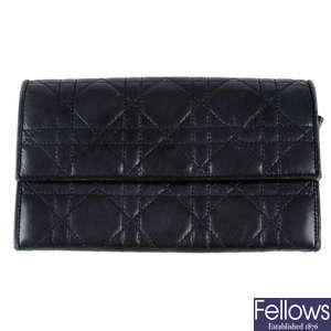 CHRISTIAN DIOR - a black Lady Dior Cannage long wallet.