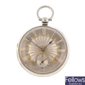 A silver open face pocket watch with two white metal full hunters.