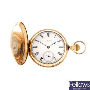 A gold plated full hunter pocket watch by Waltham with two full hunter pocket watches.