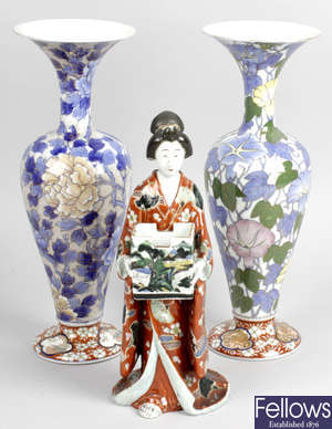 A near pair of late 19th/early 20th century Fukaguwa vases, together with a late 19th century Oriental figure of a Geisha girl.