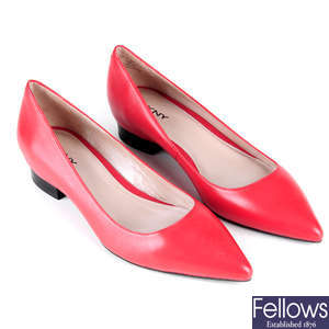 DKNY - a pair of red pointed flat leather shoes.