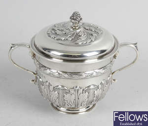 A 1920's small silver cup & cover.