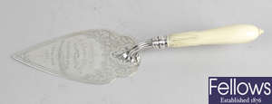 A Victorian silver & ivory-handled presentation trowel to S. A. Daniell & a plated trowel. (2). 
