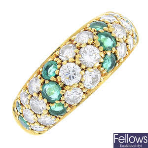 An 18ct gold diamond and emerald ring.