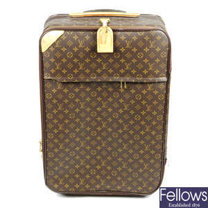 LOUIS VUITTON - a Monogram Pégase 65 rollring suitcase. AF.