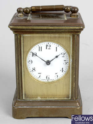 An early 20th century brass cased miniature carriage clock.