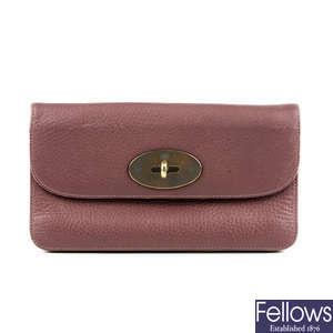 MULBERRY - a mauve Long Locked leather purse.